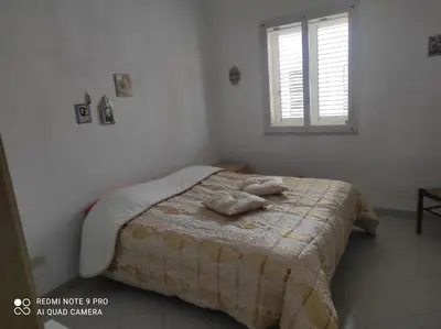 Letto o letti in una camera di Special home fontane bianche