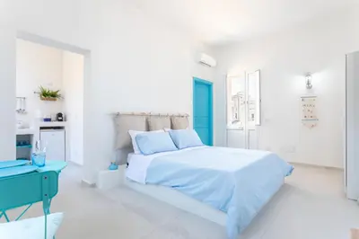 Letto o letti in una camera di Darsena Sunset Apartments by Wonderful Italy