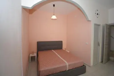 Letto o letti in una camera di Cuore di Casa 2