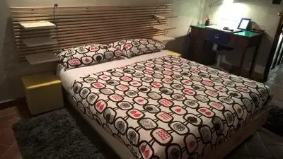 Letto o letti in una camera di b&b Luna