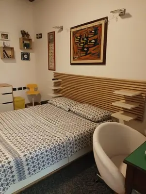 Letto o letti in una camera di b&b Luna