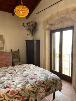 Letto o letti in una camera di Mater Familias Oasis