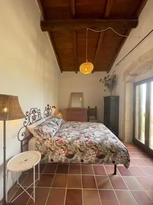 Letto o letti in una camera di Mater Familias Oasis