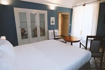 Letto o letti in una camera di Foresteria del Teatro Donnafugata