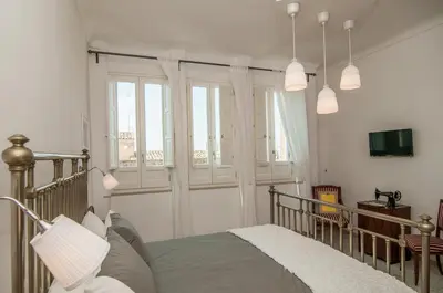 Letto o letti in una camera di B&B Novecento Siciliano