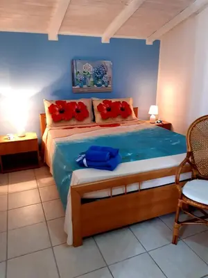 Letto o letti in una camera di Casa Marina Maltese via ucca marina SANTA MARIA DEL FOCALLO ISPICA