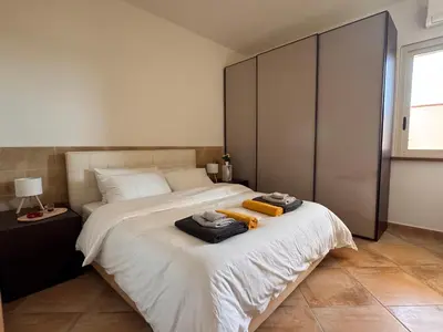 Letto o letti in una camera di Casa Aurora sul Mare