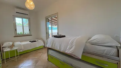 Letto o letti in una camera di Casa Aurora sul Mare