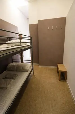 Letto o letti in una camera di K-Smart