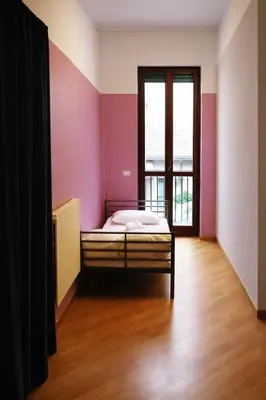 Letto o letti in una camera di K-Smart