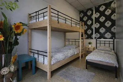 Letto o letti in una camera di K-Smart