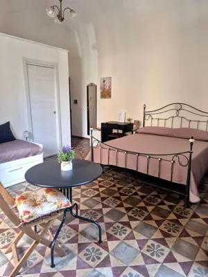 Letto o letti in una camera di Dolce Catania