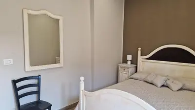 Letto o letti in una camera di Giully's Rooms