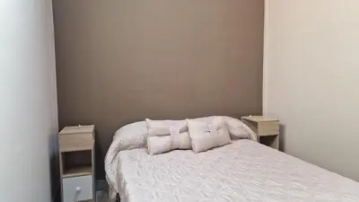 Letto o letti in una camera di Giully's Rooms