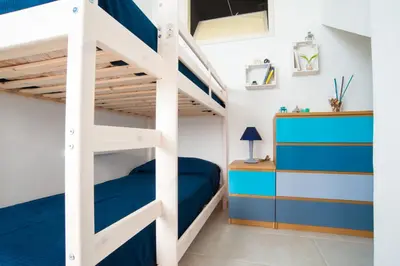 Letto o letti in una camera di Villa Margiu - Casa Ossino