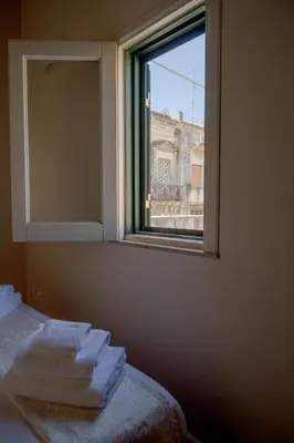 Letto o letti in una camera di Casa di charme 