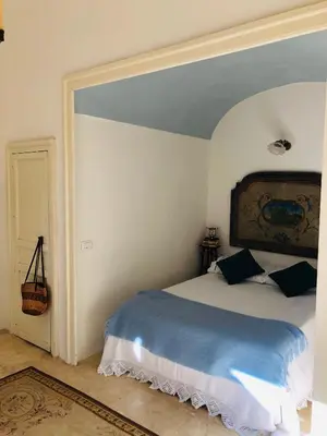 Letto o letti in una camera di Villa Vela