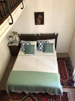 Letto o letti in una camera di Villa Vela