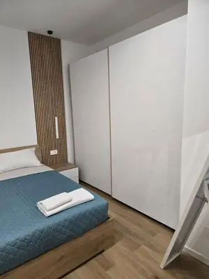 Letto o letti in una camera di Castellano Home - Grimaldi