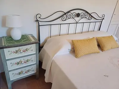 Letto o letti in una camera di A casa di Carmen