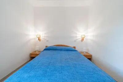 Letto o letti in una camera di Sogno d'estate