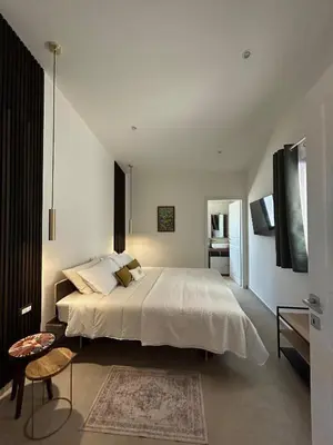 Letto o letti in una camera di Casa Sirokos
