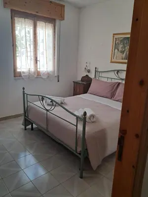 Letto o letti in una camera di Il Giardino di Carmen