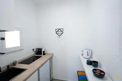 Cucina o angolo cottura di Nymphē Ortigia Apartments