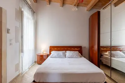 Letto o letti in una camera di A 100 metri da Piazza Duomo di Ortigia by Wonderful Italy