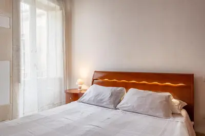 Letto o letti in una camera di A 100 metri da Piazza Duomo di Ortigia by Wonderful Italy