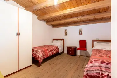 Letto o letti in una camera di A 100 metri da Piazza Duomo di Ortigia by Wonderful Italy