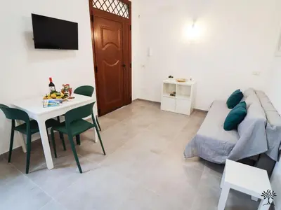 TV o dispositivi per l'intrattenimento presso Radici Sicilian Holiday Home - A An Oasis of Relaxation in the Heart of Sicily