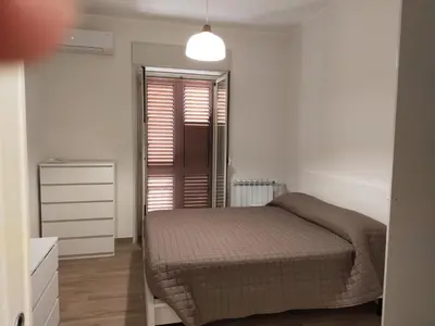 Letto o letti in una camera di Appartamento Astrea