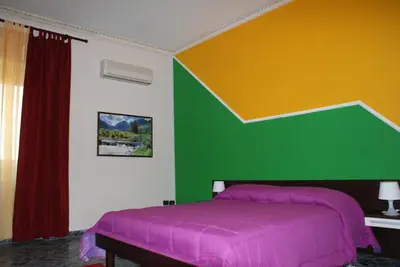 Letto o letti in una camera di Appartamento Astrea