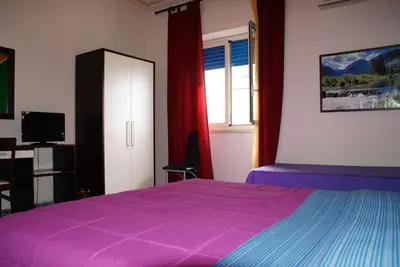 Letto o letti in una camera di Appartamento Astrea