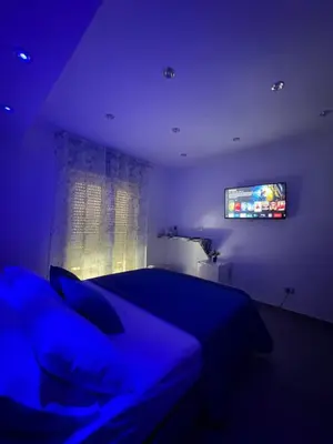 Letto o letti in una camera di Rooms La Playa