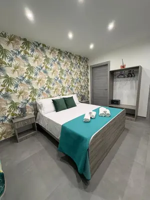 Letto o letti in una camera di Rooms La Playa