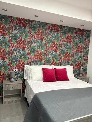 Letto o letti in una camera di Rooms La Playa