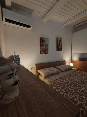 Letto o letti in una camera di Casa vacanze Don Fefè