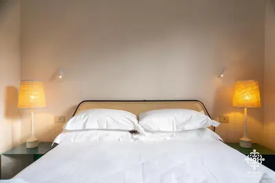 Letto o letti in una camera di Casa Aia - Rifugio Naturalistico