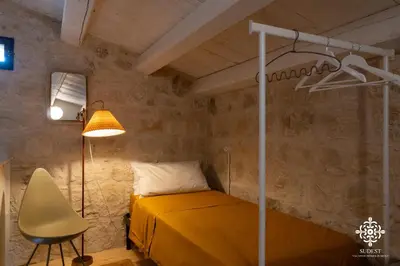 Letto o letti in una camera di Casa Aia - Rifugio Naturalistico