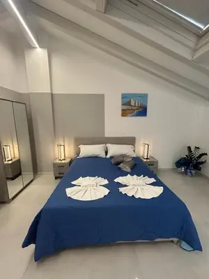 Letto o letti in una camera di Gammazita Luxury Home