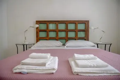 Letto o letti in una camera di Rosa Dei Venti