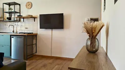 Cucina o angolo cottura di Marconi Hub Siracusa, appartamento moderno vicino ad Ortigia con Wifi e AC
