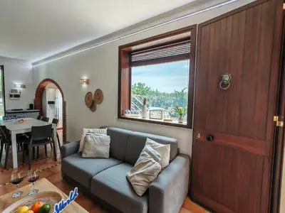 Area soggiorno di Villa Biancolilla by Holiday World