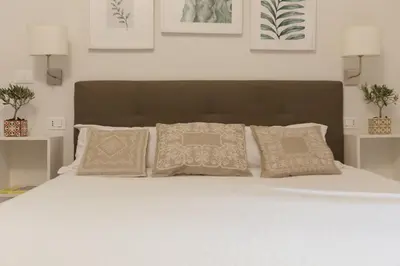 Letto o letti in una camera di Stay in Catania