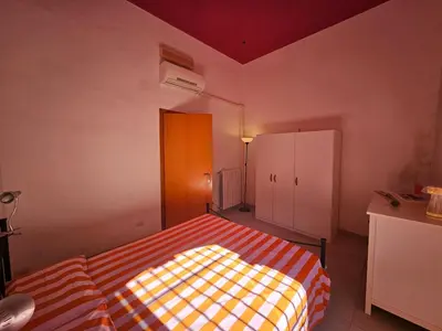 Letto o letti in una camera di A week in Sicily - charming apartment