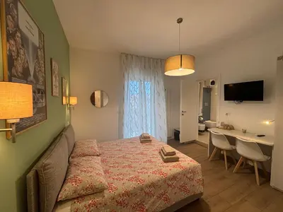 Letto o letti in una camera di Mascarata