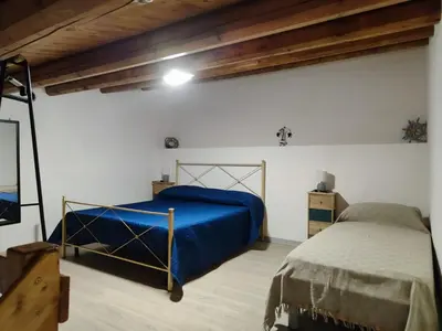 Letto o letti in una camera di Cavour Apartaments