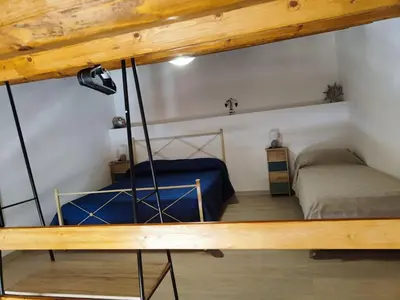 Letto o letti in una camera di Cavour Apartaments